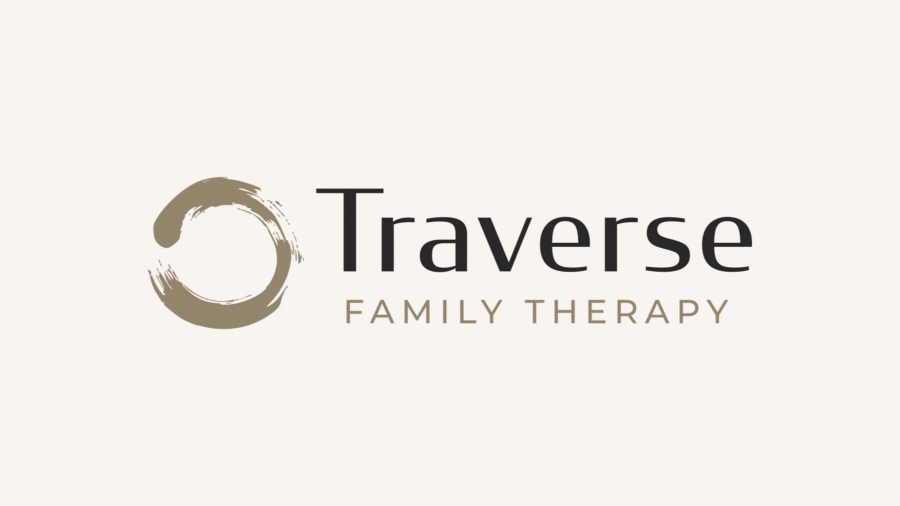 The Traverse Family Therapy logo: a brushed circle beside the words Traverse Family Therapy.